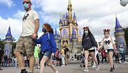 What is the dress code at Disney’s theme parks?