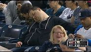 Fan sleeps in stands during game vs. Red Sox