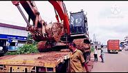Tata Hitachi 220 excavator loading and unloading