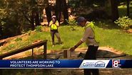 Volunteers work to protect Thompson Lake