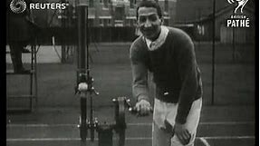 QUIRKY: TENNIS CHAMPION JEAN RENE LACOSTE DEMONSTRATING TENNIS AUTO -GUN MACHINE (1928)