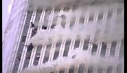 Above the 100th floor, WTC1 burns on 9/11 - stabilized