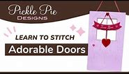 Learn to stitch Adorable Doors In-the-Hoop Machine Embroidery Designs from Pickle Pie Designs