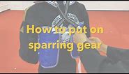 How to put on sparring gear