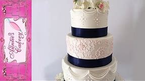 Pastel Pink and Navy Blue decorated Wedding Cake