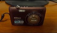 A Purple Nikon Digital Camera - Nikon Coolpix S4100