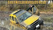 Gen 1 Nissan Xterra Off-Road in Deep Mud