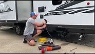 RV campground setup procedures for water, sewer and electric hookups