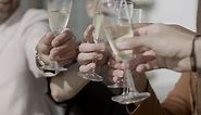Free stock video - Close-up shot of peoples hands clinking glasses of champagne