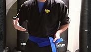 Learning how to properly tie your... - Premier Martial Arts