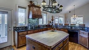 How To Lighten Dark Wood Kitchen Cabinets (Quickly & Easily!)