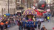 Giant inflatable Queen’s guard floats through London for New Year’s Day parade