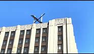 New logo 'X' installed on Twitter headquarters in San Francisco | AFP