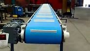 Cleated belt conveyors