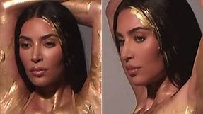 Kim Kardashian is painted in gold for KKW Fragrance