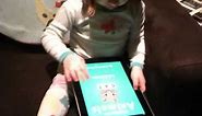 A 2.5 Year-Old Has A First Encounter with An iPad