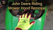 How to remove the hood on a John Deere riding mower most 100 series models.