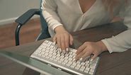 Free stock video - Female hands typing on laptop keyboard
