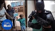Heart-warming moment Batman surprises little boy in hospital