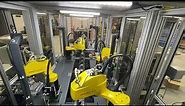 Assembly Automation with Fanuc Scara Robots, vision, and Indexing Conveyor using Vibratory Feeders