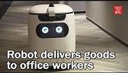 Autonomous robot delivers goods to office workers