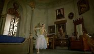Ballerina performs classic ballet spins in a vintage decorated bedroom - Free Stock Video
