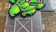 Little generation 1 bulbasaur is getting wrapped up! I absolutely love how this Pokémon perler bead pattern came out. These original sprites have some kinda pixel perler bead magic in them that sets them apart. Join the fun! Follow me for daily videos of Pokémon and perler bead content, including Pokémon quizzes, tutorials, Pokémon lore, and much more. Plus, I turn your comments into stunning perler bead designs! Don't miss out on the excitement. Follow me now and be part of the community. #poke