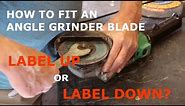 How to fit an Angle Grinder blade, label up or label down?