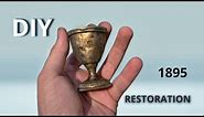 Restoration of an antique silver wine glass from 1895