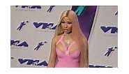 Nicki Minaj nearly busts out of pink latex catsuit at VMAs