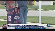 Walker unveils flag collection box on Veterans Day