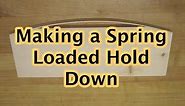 Spring Loaded Hold Down