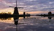 See the Windmills of Kinderdijk in the Netherlands, a UNESCO World Heritage Site