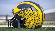 What are the stickers on college football helmets?