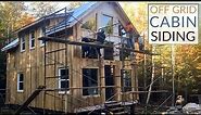 Off Grid Cabin Siding | vertical wood siding