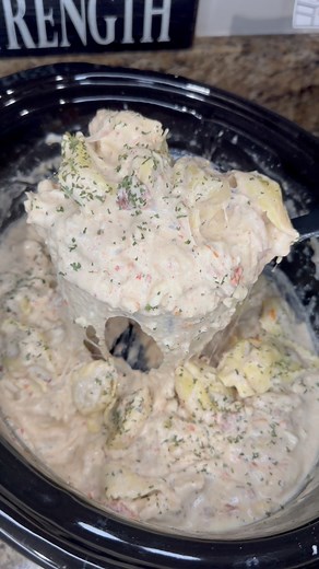 Crockpot Marry Me Chicken Tortellini Ingredients • 2 large boneless skinless chicken breasts, cut into cubes • 1 (8 oz) block cream cheese, cubed • 1 cup chicken broth • ½ cup chopped sun-dried tomatoes (in oil, drained) • 1 tsp garlic powder • 1 tsp Italian seasoning • ½ tsp black pepper • ½ tsp salt • 1 (20 oz) bag refrigerated chicken mozzarella tortellini • 2 cups shredded mozzarella cheese • ½ cup grated Parmesan cheese • 1 cup heavy cream • Parsley flakes, for garnish Instructions 1. Add c