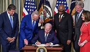 President Joe Biden signs major climate, health care and tax bill into law