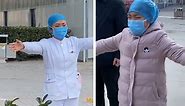 Coronavirus: Heartbreaking video shows Chinese nurse giving ‘air hug’ to daughter from quarantined zone
