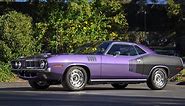 This Plum Crazy Purple 1971 Plymouth 'Cuda 440-6 is a Rare Numbers-Matching Track Pak American Muscle Car