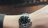 Omega Seamaster Black Diamond Dial Steel Watch 212.30.28.61.51.001 Wrist Roll | SwissWatchExpo
