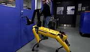 Boston Dynamics robot fights back against armed man to open door and enter room