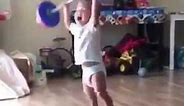 Funny Baby Lifts weight and Screams