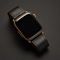 Gold Apple Watch with Black Leather Band