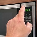 Oster Microwave Oven Set Clock