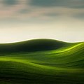 Rolling Green Hills with Stream Wallpaper