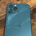 The Back of a iPhone 12. Bake Glass Cracked