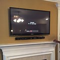 Wall Mounted TV above Fireplace