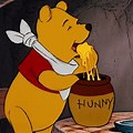 Winnie the Pooh Holding Honey Greengrass