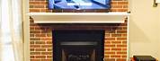 Hanging Frame TV On Stone Fireplace