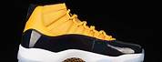 Jordan 11 Retro Black and Yellow Low